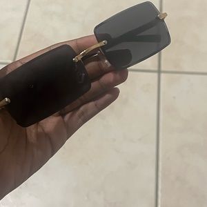 Black and gold glasses